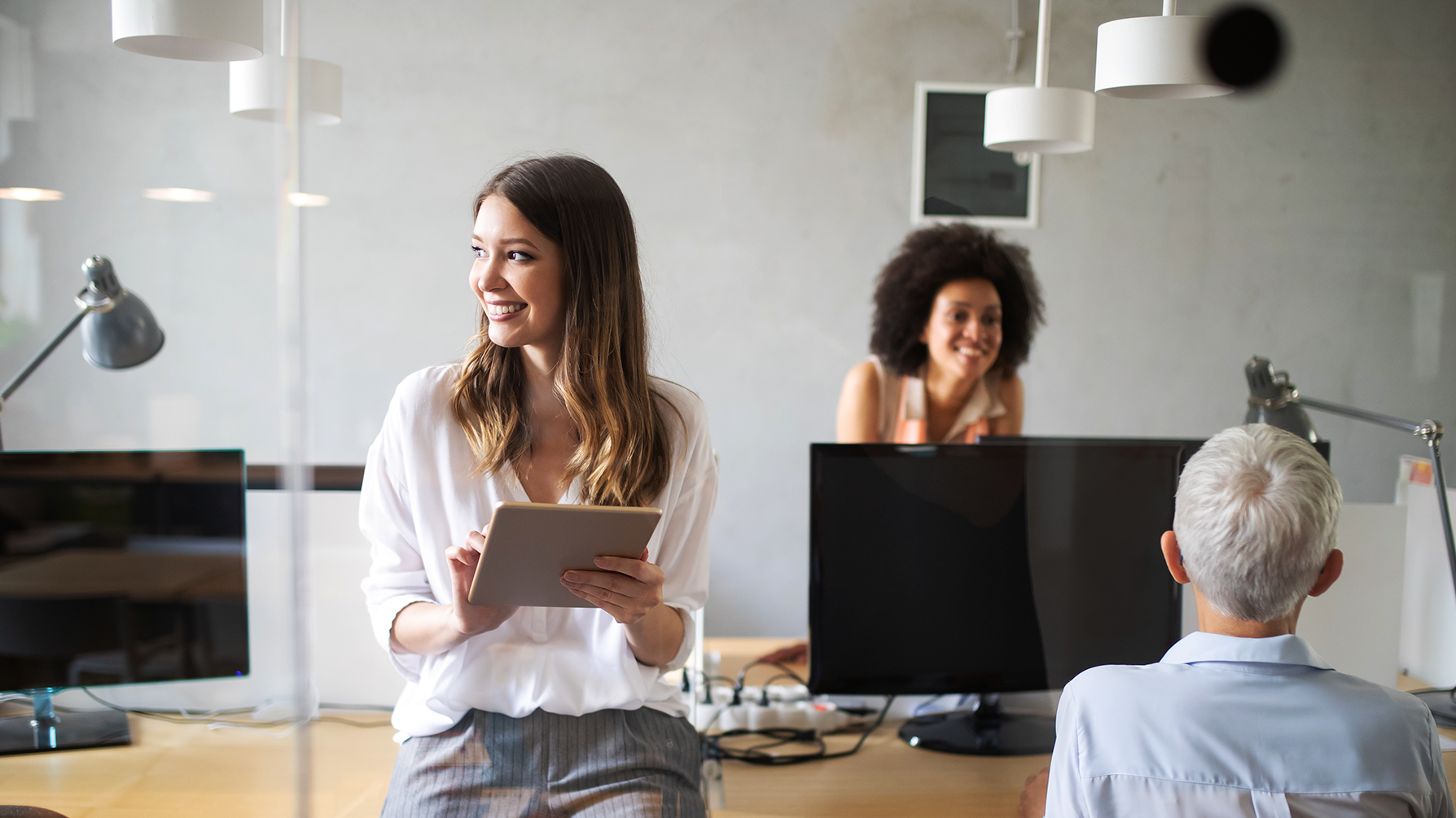 Young business professionals in office boardroom