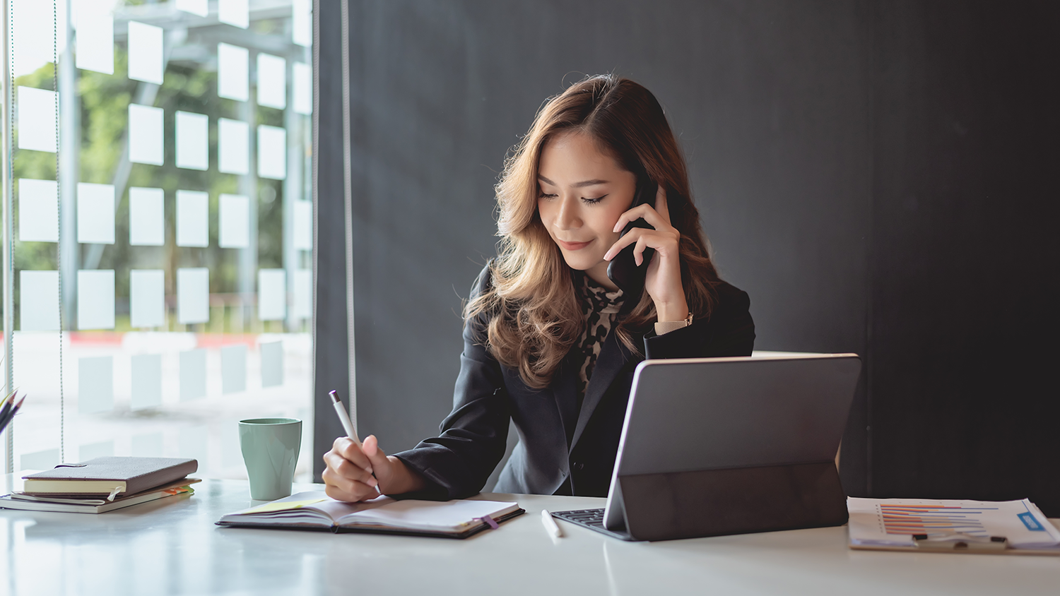 Young office worker calling IT support